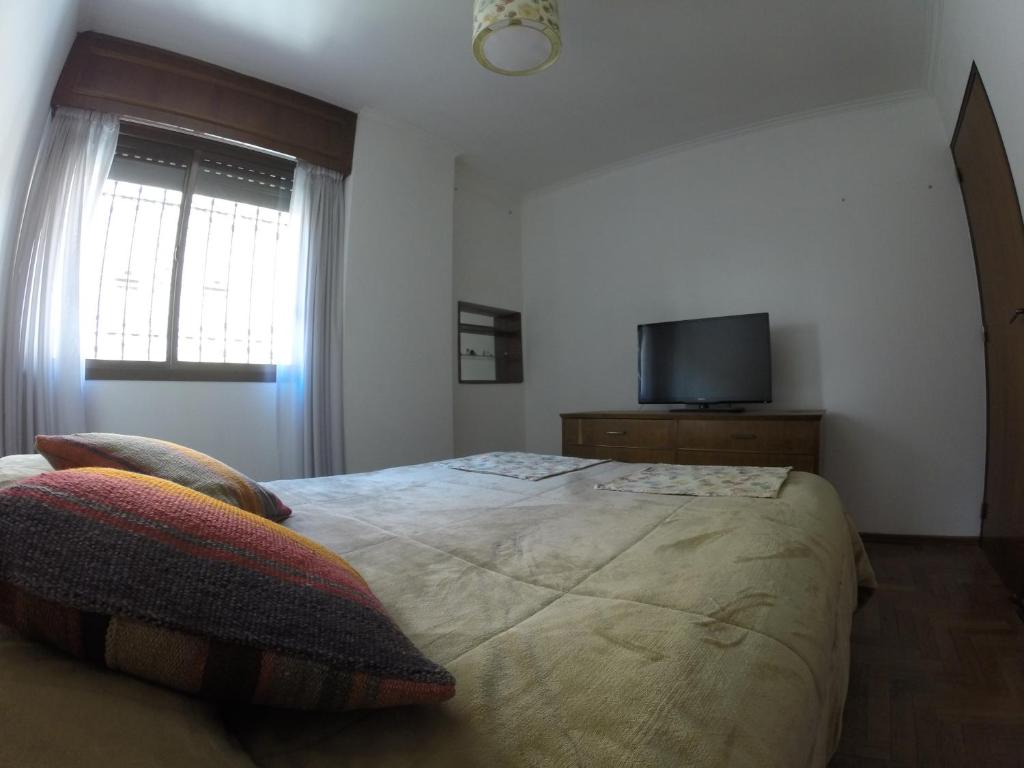 Łóżko lub łóżka w pokoju w obiekcie 9 de Julio Confort - Bienes Reales