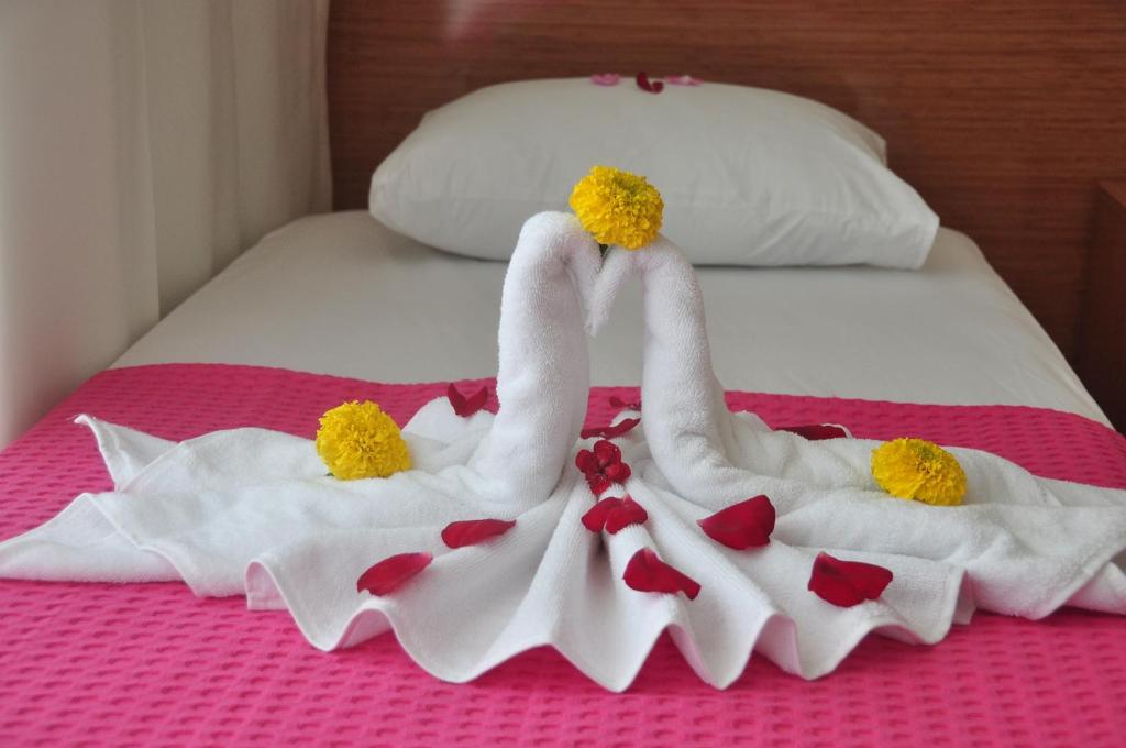Postel nebo postele na pokoji v ubytování Önder Yıldız Hotel