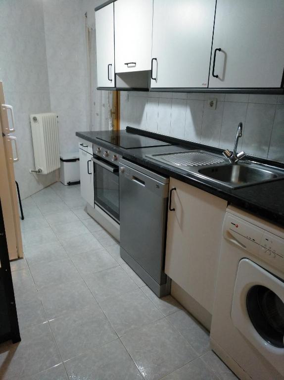 Kuchyň nebo kuchyňský kout v ubytování Best Biescas Tourist Home
