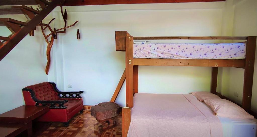 Postel nebo postele na pokoji v ubytování VAGO HOSTEL