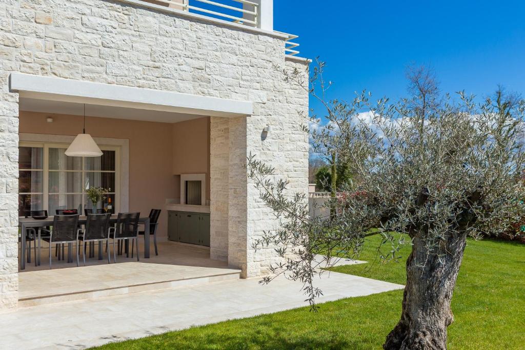 Ein Garten an der Unterkunft Villa Grace by ILC (Istria Luxury Collection)