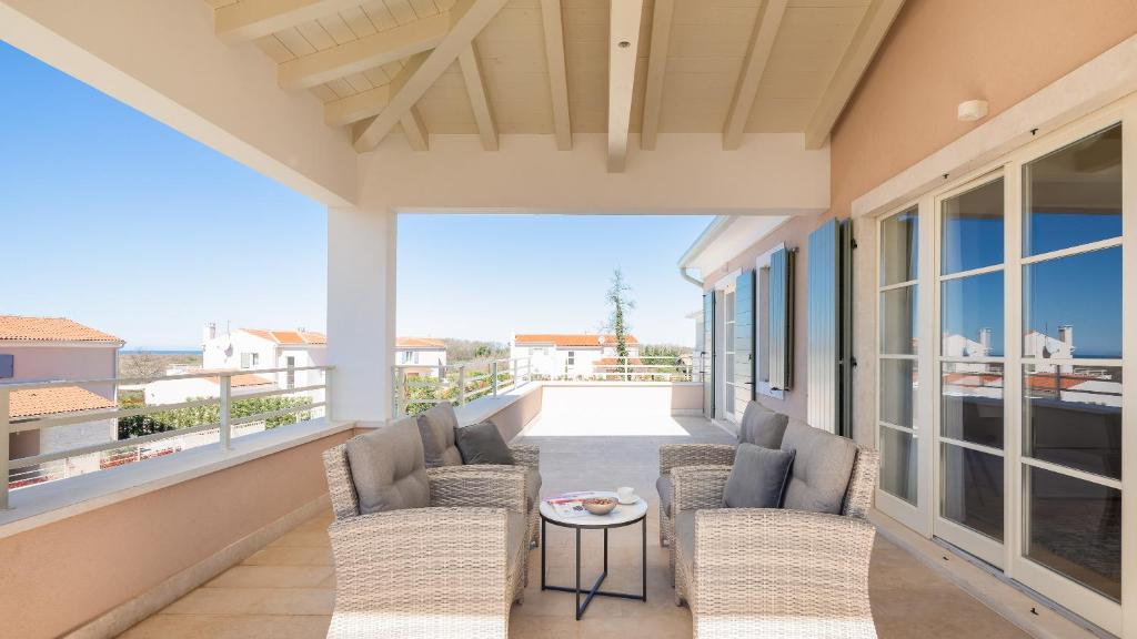 Ein Balkon oder eine Terrasse in der Unterkunft Villa Grace by ILC (Istria Luxury Collection)