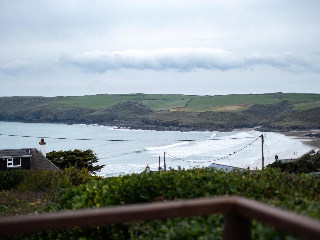 a view of the ocean from a balcony of a house at Shorelands in Wadebridge
