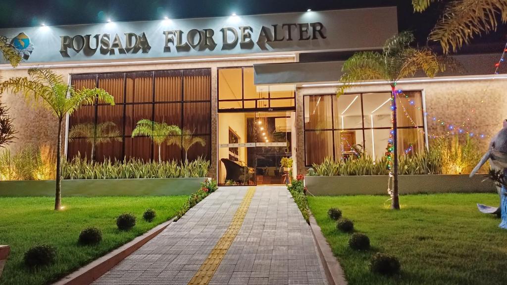 a store front of a building at night at Pousada Flor de Alter in Alter do Chao