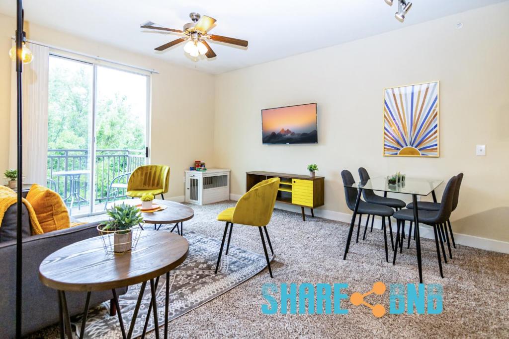 a living room with a table and chairs at Business Travel - Fast Wi-fi - Pets in Dallas