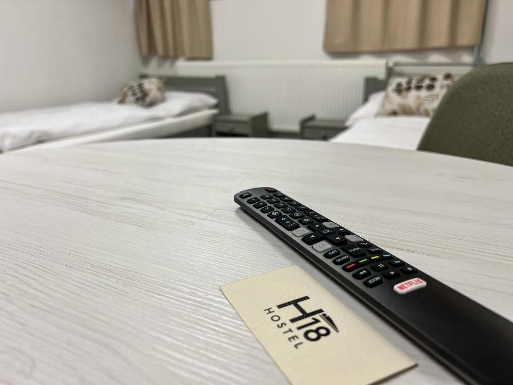 Posteľ alebo postele v izbe v ubytovaní Hostel H18