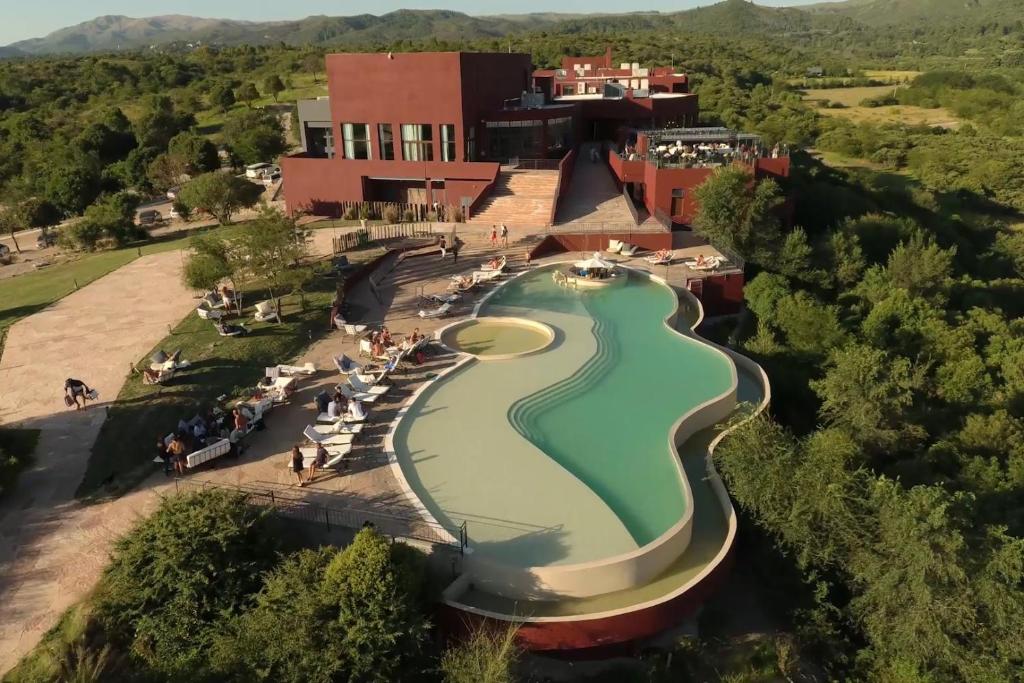 an aerial view of the golf course at a resort at Pueblo Nativo Resort Golf & Spa in La Cumbre