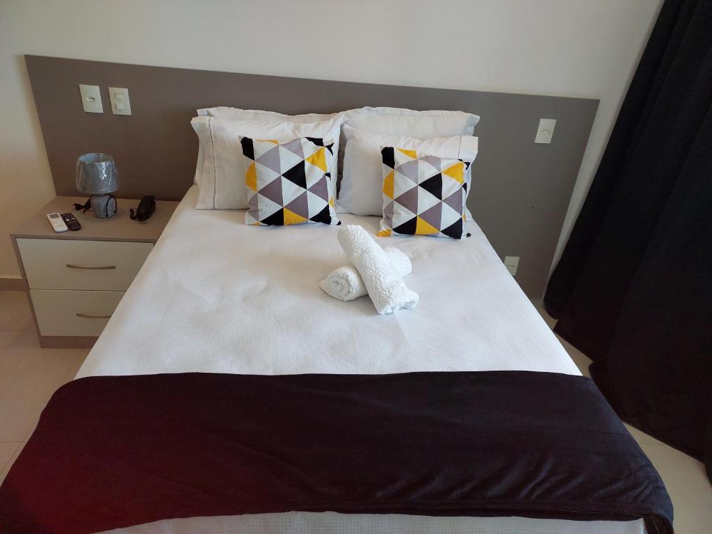 Postel nebo postele na pokoji v ubytování Flat América Pelinca Campos