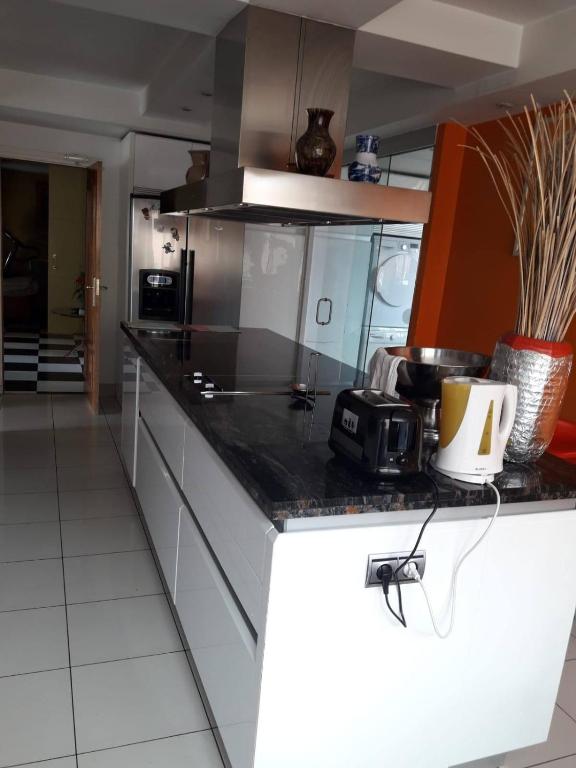 Kuchyň nebo kuchyňský kout v ubytování H1-Habitación sublime cama doble luminosa A/C WIFI
