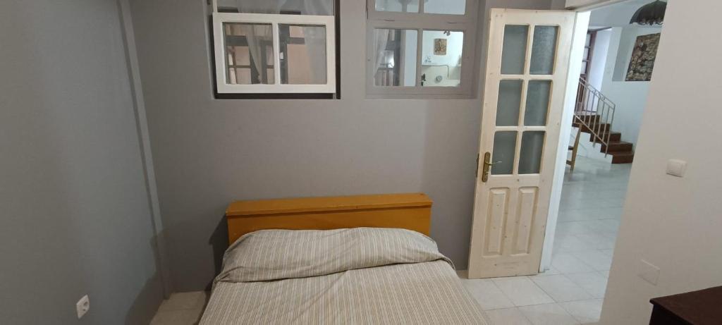 Postel nebo postele na pokoji v ubytování Kaza Jindung