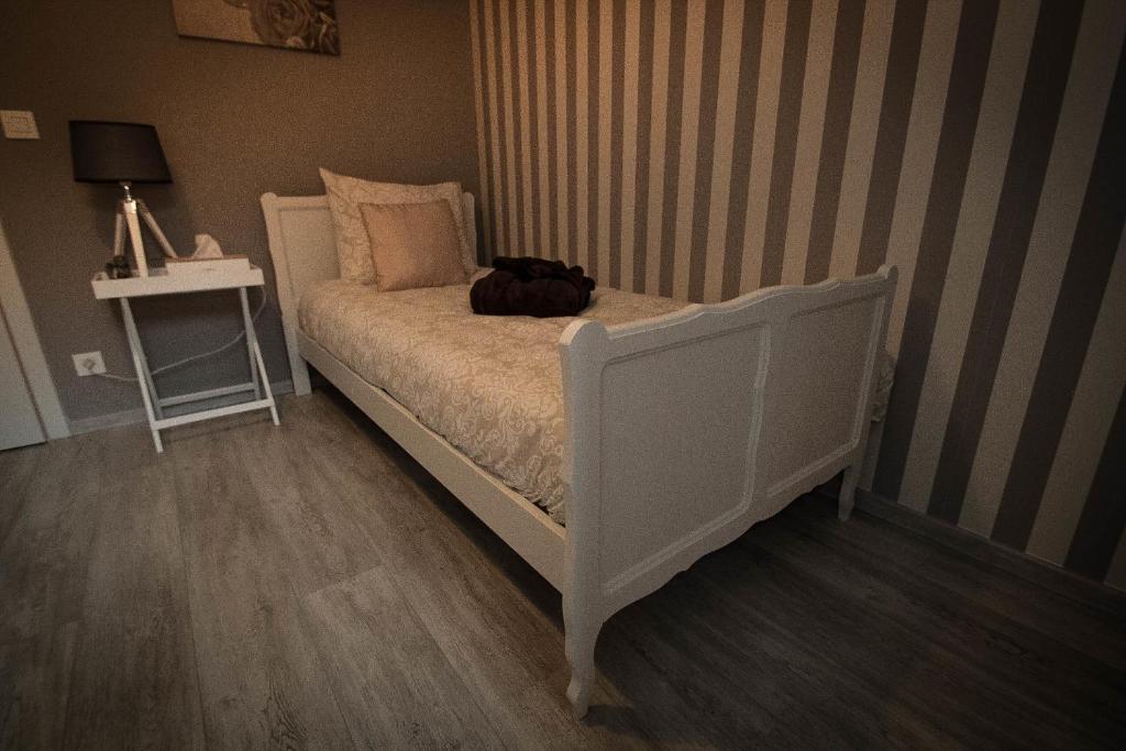 Postel nebo postele na pokoji v ubytování Interbellum