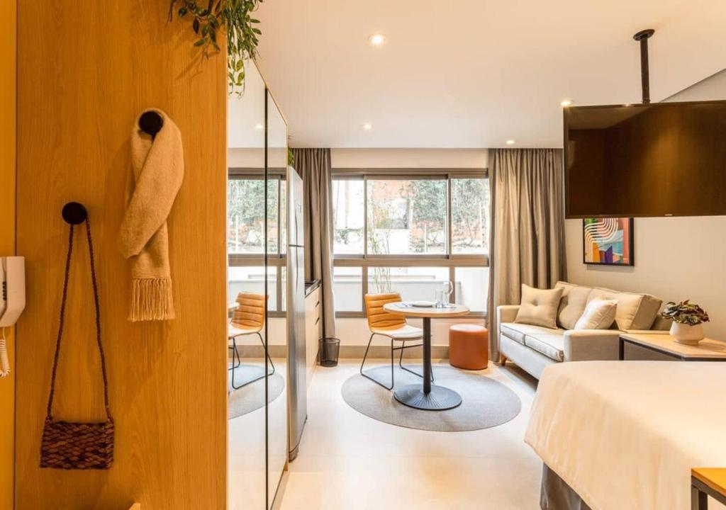 Posezení v ubytování Cozzy Suites Paraíso Hotel
