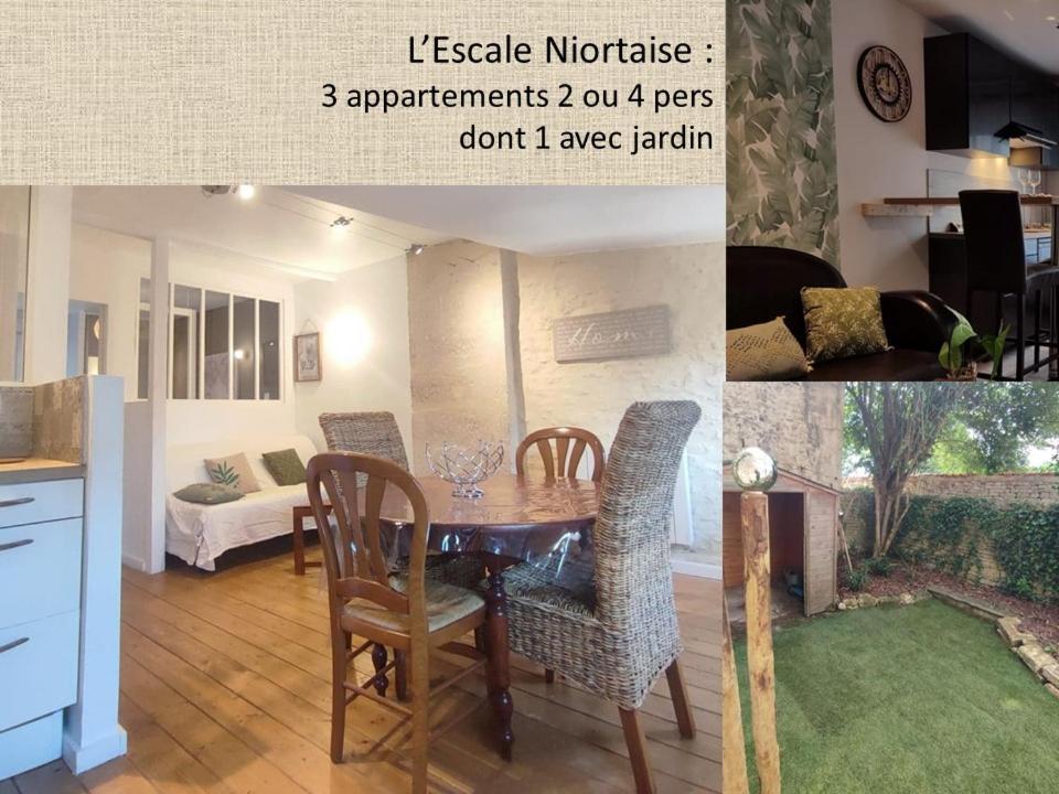 L'escale Niortaise - Centre-ville - 10mn Gare - WIFI - Netflix في نيورْ: مطبخ وغرفة طعام مع طاولة وكراسي
