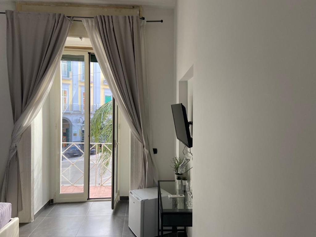 Kuchyňa alebo kuchynka v ubytovaní Doria Suites Napoli