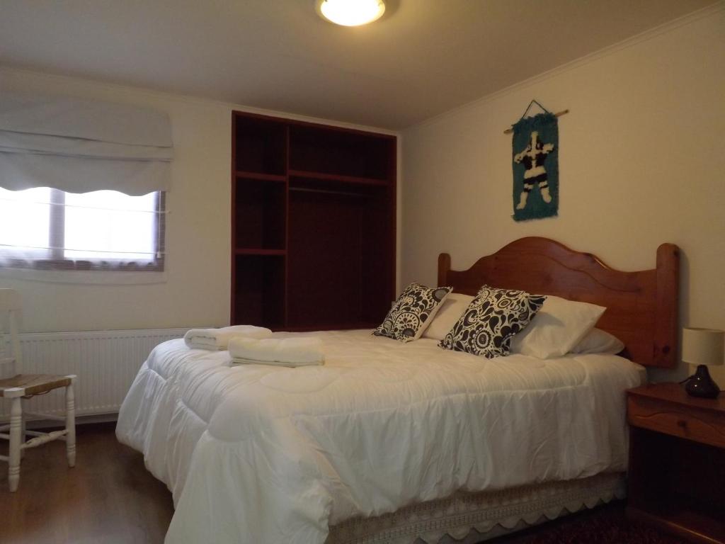 Postel nebo postele na pokoji v ubytování Hotel Milodon