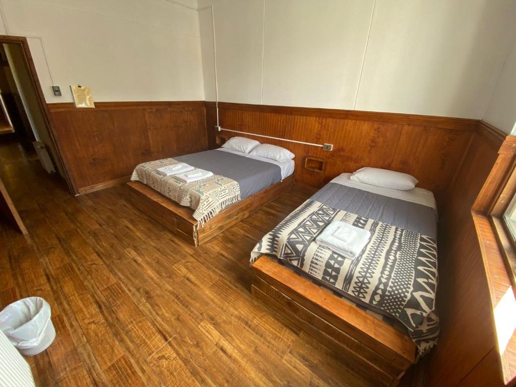 Postel nebo postele na pokoji v ubytování Hostal Ochen