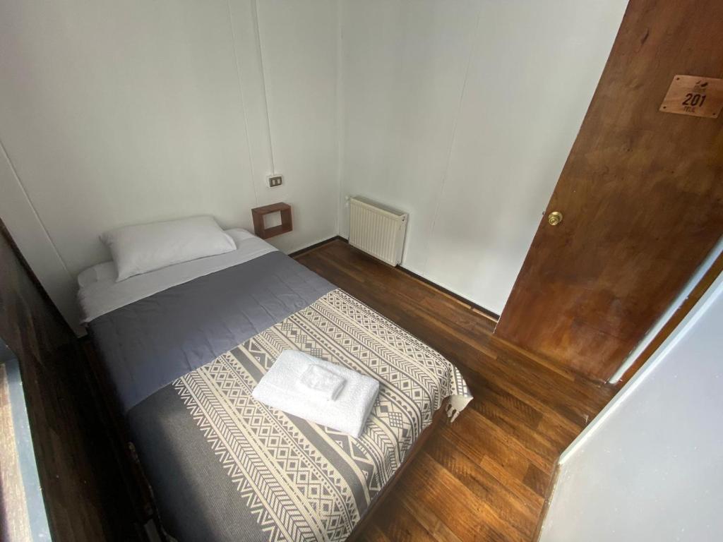 Postel nebo postele na pokoji v ubytování Hostal Ochen