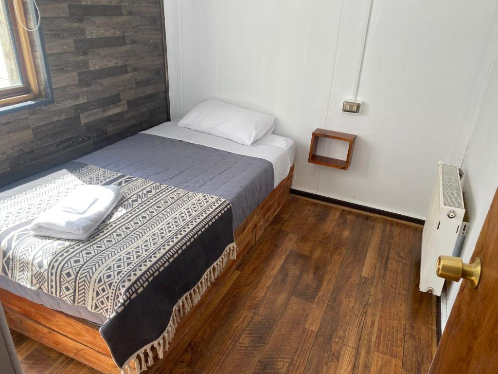 Postel nebo postele na pokoji v ubytování Hostal Ochen
