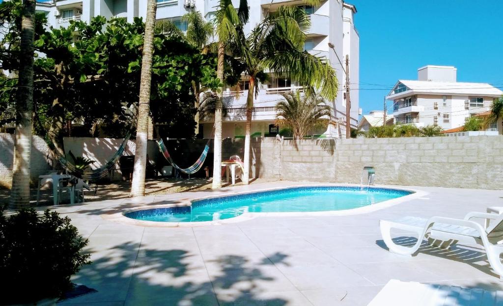 Bazén v ubytování Flat Residencial Simas nebo v jeho okolí