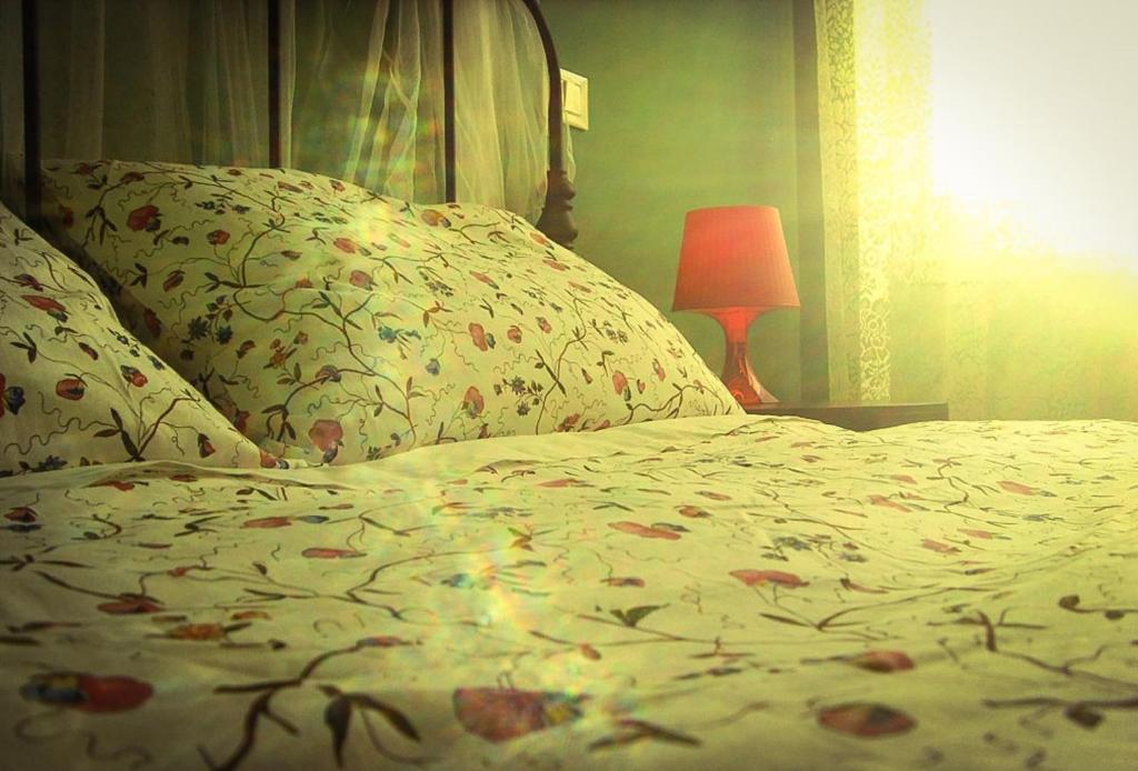Postel nebo postele na pokoji v ubytování B&B Amerigo Vespucci