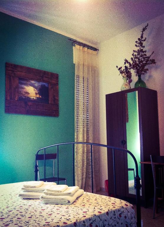 Postel nebo postele na pokoji v ubytování B&B Amerigo Vespucci