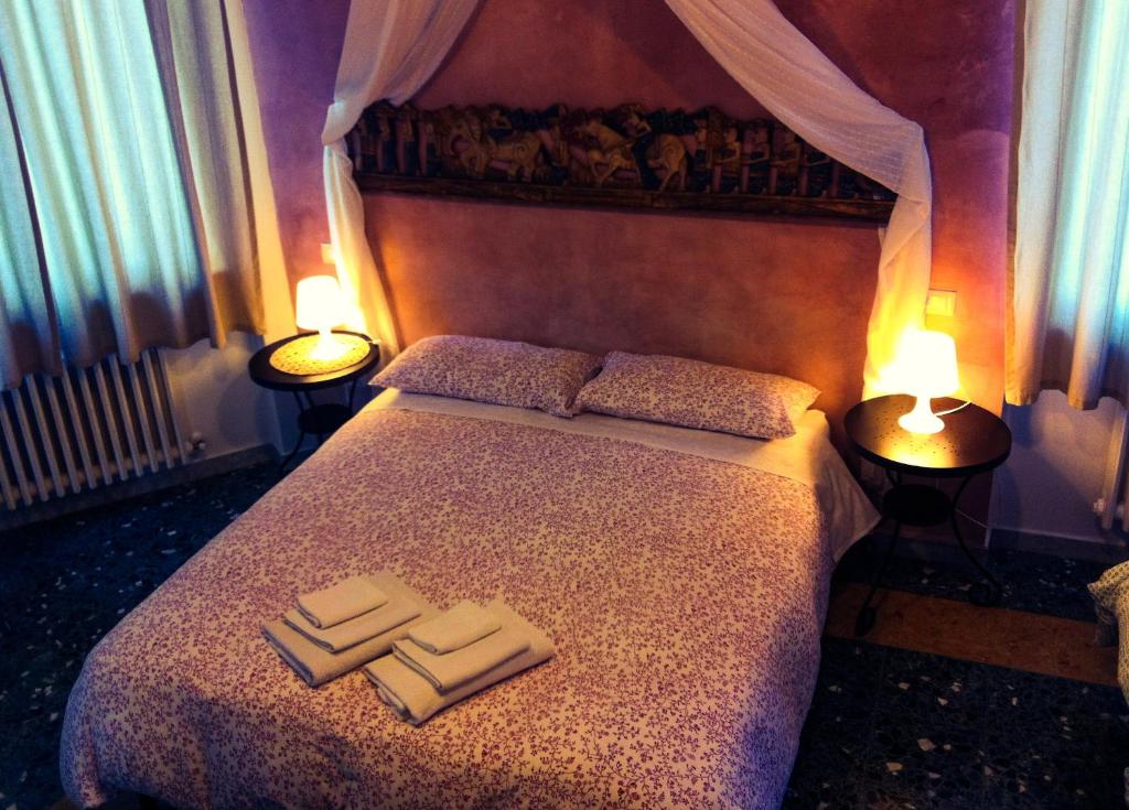 Postel nebo postele na pokoji v ubytování B&B Amerigo Vespucci
