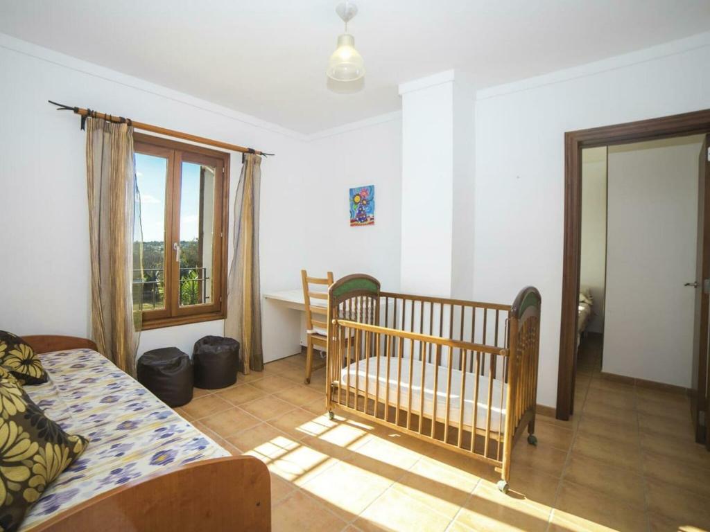 Postel nebo postele na pokoji v ubytování Villa in Muro near Can Picafort Beach