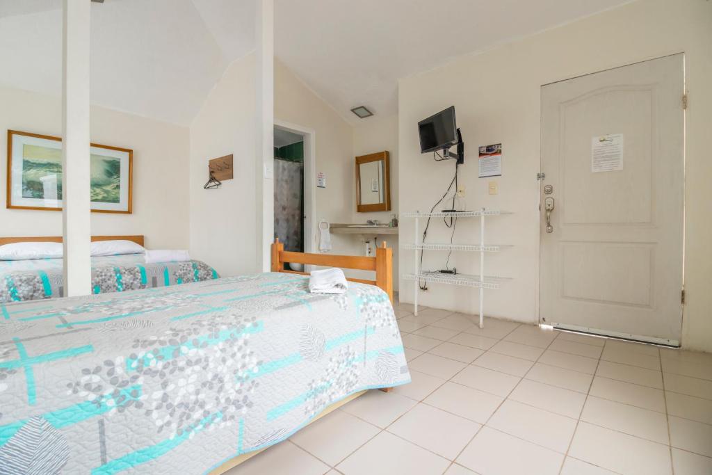 Postel nebo postele na pokoji v ubytování Oceanic Lodge