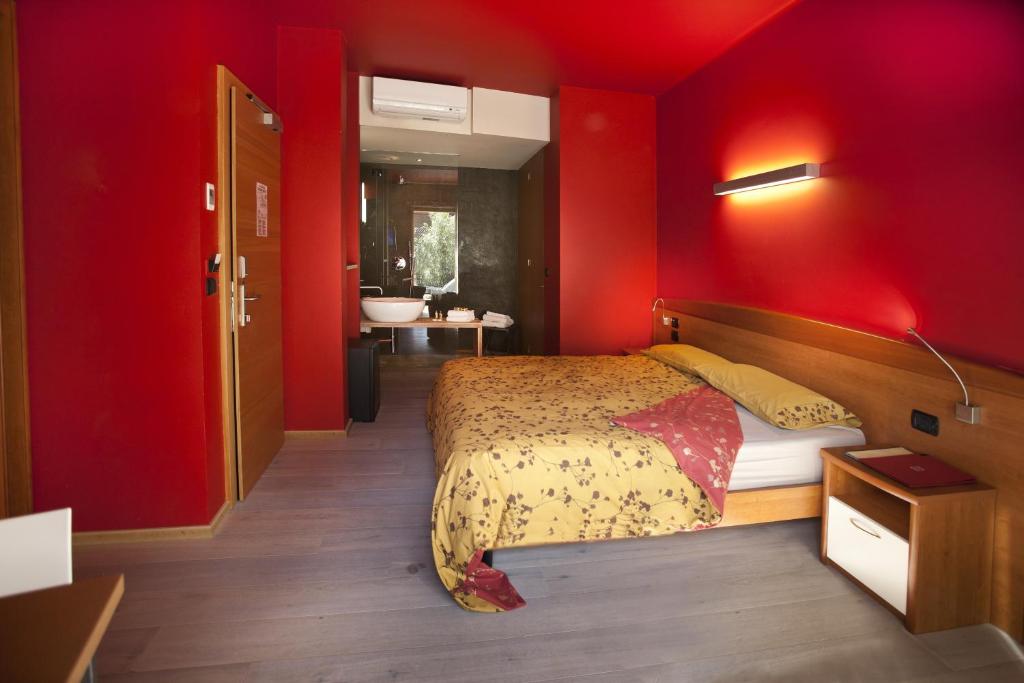 Postel nebo postele na pokoji v ubytování Ambienthotel Spiaggia