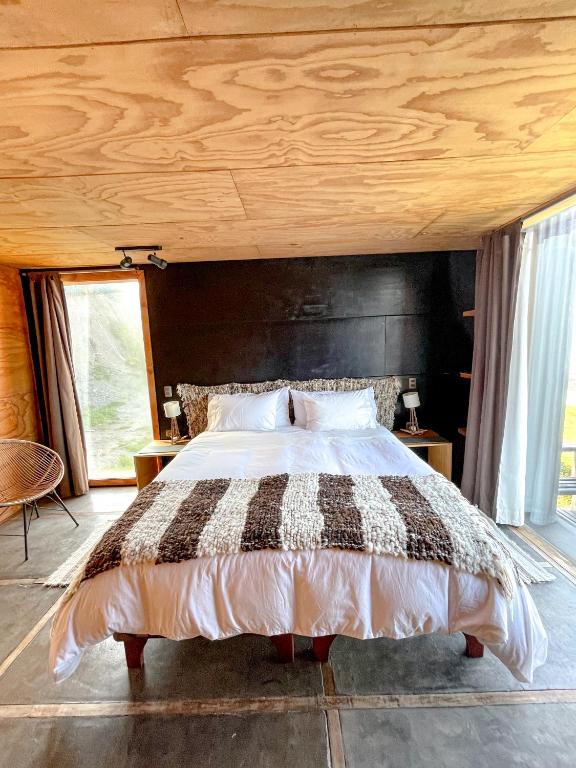 Postel nebo postele na pokoji v ubytování El Coo Lodge