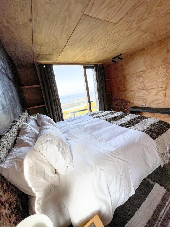 Postel nebo postele na pokoji v ubytování El Coo Lodge