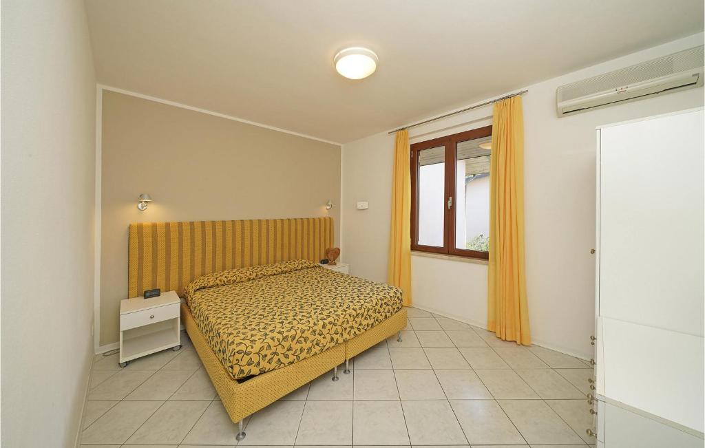 A bed or beds in a room at Bilocale