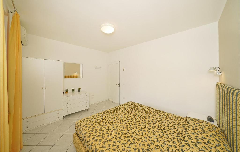 A bed or beds in a room at Bilocale