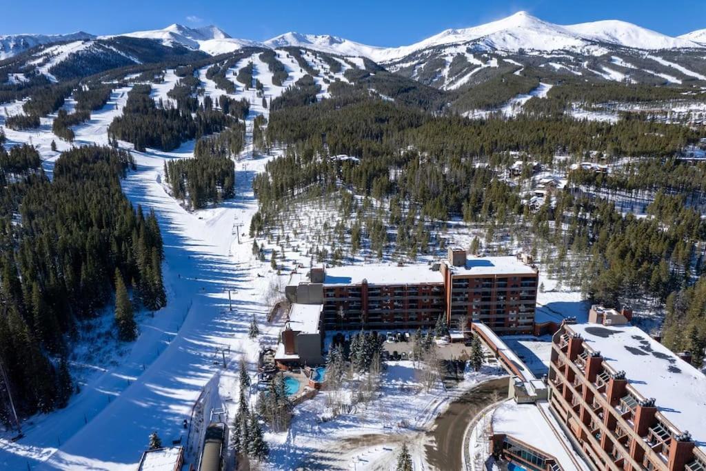an aerial view of a resort with snow covered mountains at Beaver Run Studio- Dog Friendly in Breckenridge