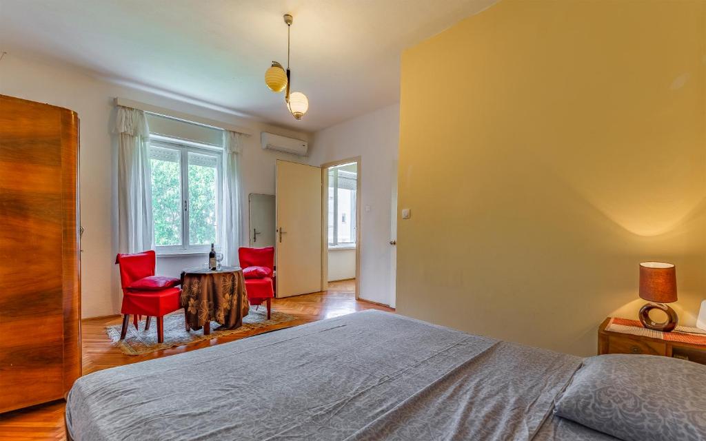 Postel nebo postele na pokoji v ubytování Liznjan - Blue Gate Manor