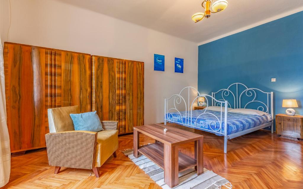 Postel nebo postele na pokoji v ubytování Liznjan - Blue Gate Manor