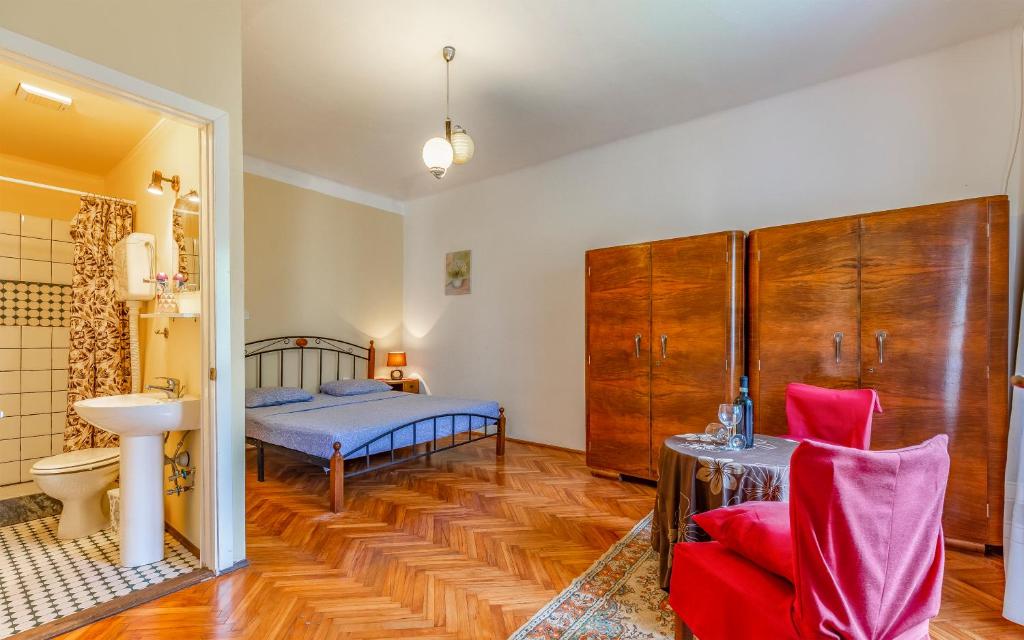 Postel nebo postele na pokoji v ubytování Liznjan - Blue Gate Manor