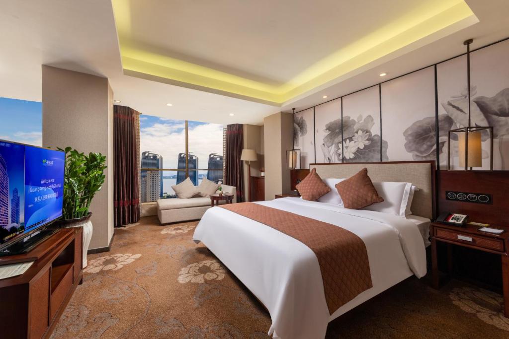TV a/nebo společenská místnost v ubytování Guangdong Hotel (Zhuhai)