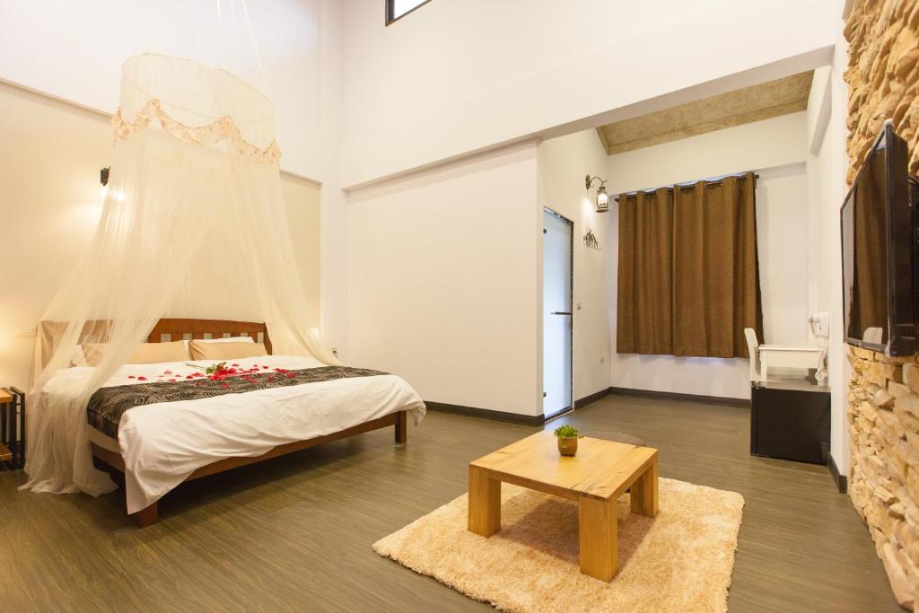 Postel nebo postele na pokoji v ubytování Summer Rocker Villa