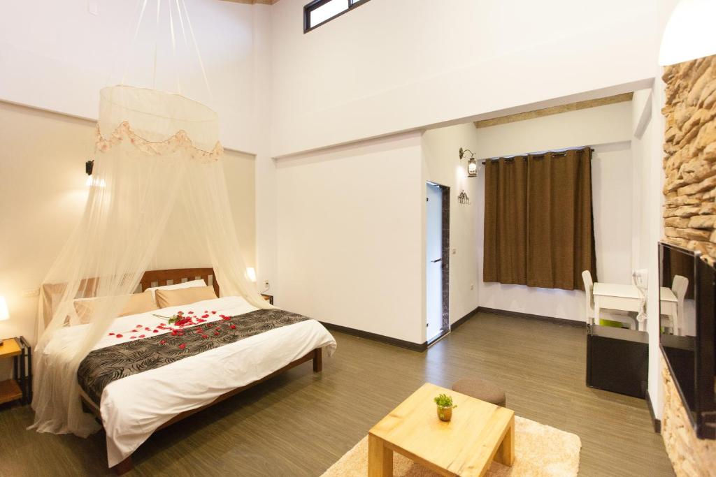 Postel nebo postele na pokoji v ubytování Summer Rocker Villa
