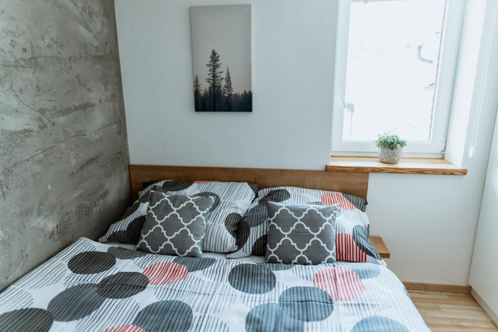 Postel nebo postele na pokoji v ubytování Apartmány Jabloneček