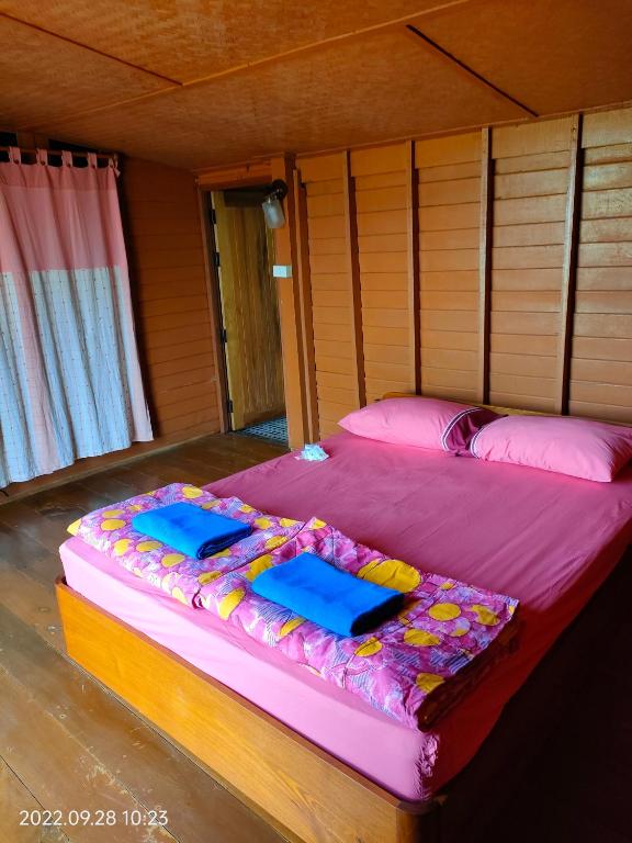 Postel nebo postele na pokoji v ubytování Inpai Resort อินปายรีสอร์ท