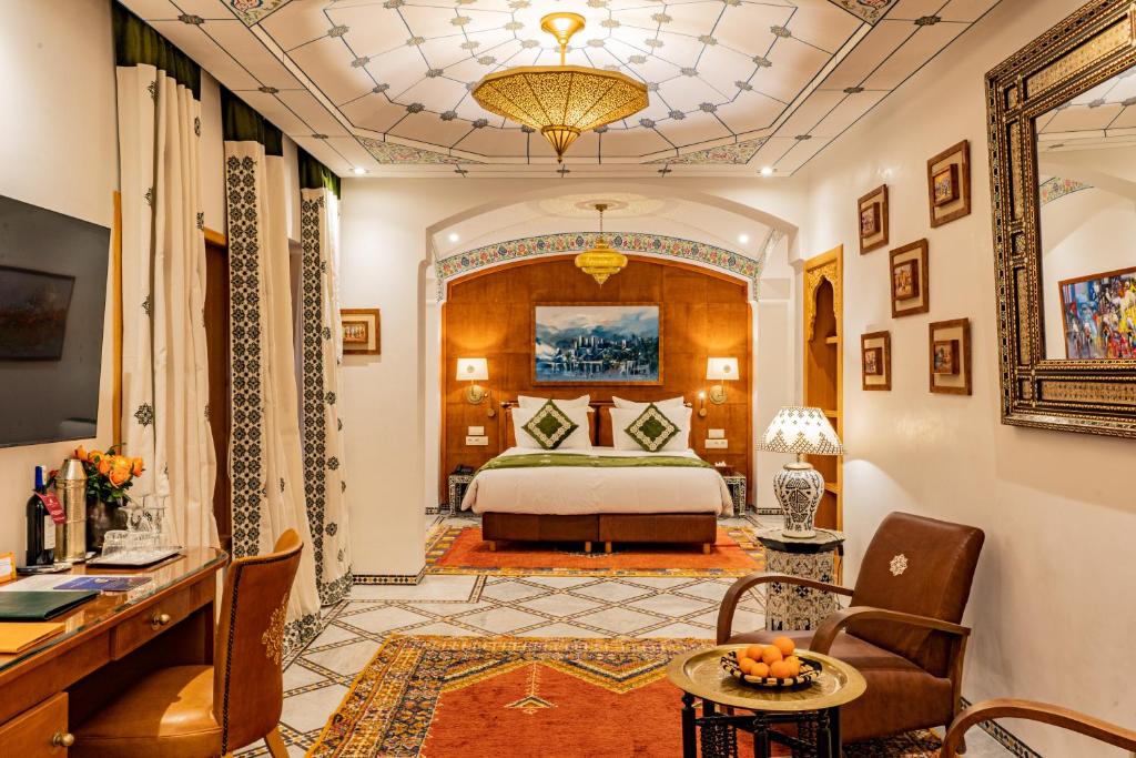 TV a/nebo společenská místnost v ubytování La Maison Arabe Hotel, Spa & Cooking Workshops