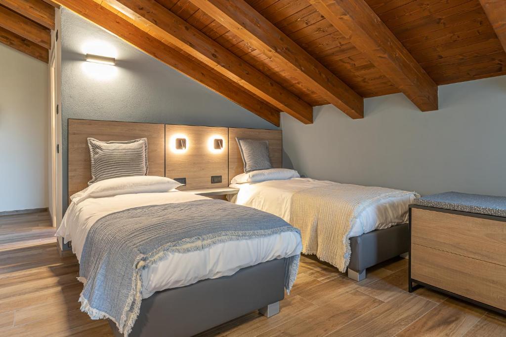 Postel nebo postele na pokoji v ubytování Hotel Mon Émile