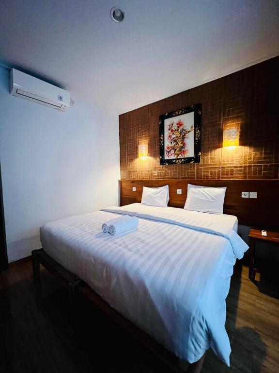 Milky Way Homestay Cangguにあるベッド