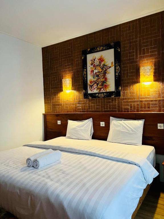 Milky Way Homestay Cangguにあるベッド