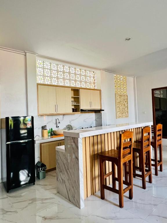 Milky Way Homestay Cangguにあるキッチンまたは簡易キッチン
