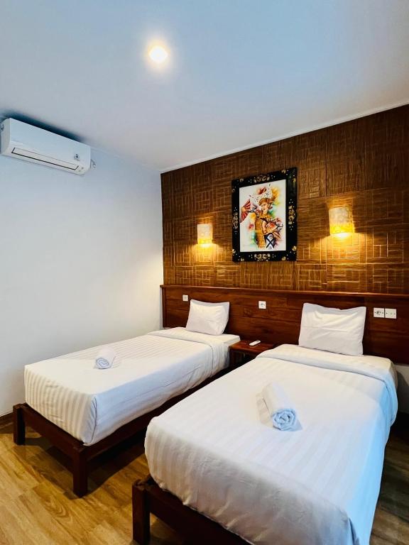 Milky Way Homestay Cangguにあるベッド