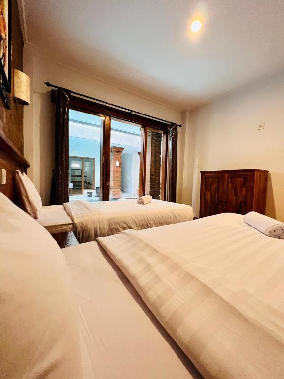 Milky Way Homestay Cangguにあるベッド