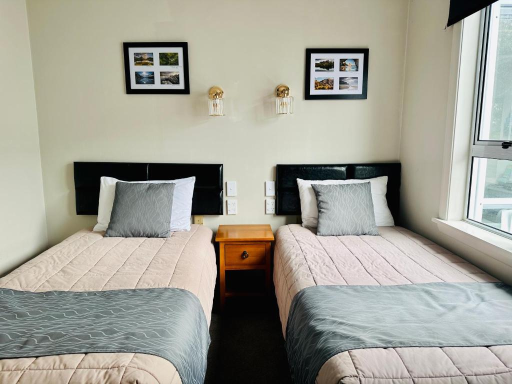 Postel nebo postele na pokoji v ubytování A1 Kaikoura Motel & Apartment